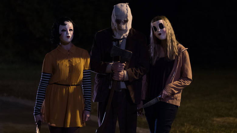 Lea Enslin, Damian Maffei, and Emma Bellomy in The Strangers: Prey at Night