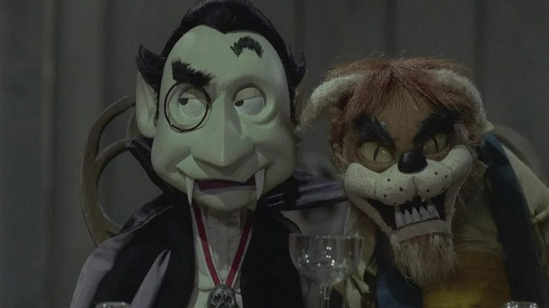 Dracula and the Wolf Man sitting at a dinner table in Mad Monster Party?