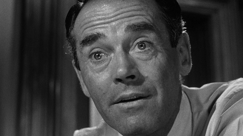 Henry Fonda looking at knife 12 Angry Men