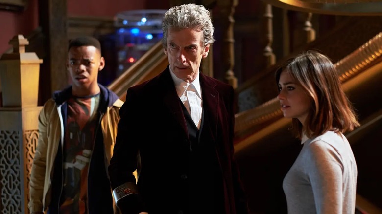 Jovian Wade, Peter Capaldi, and Jenna Coleman from "Doctor Who"