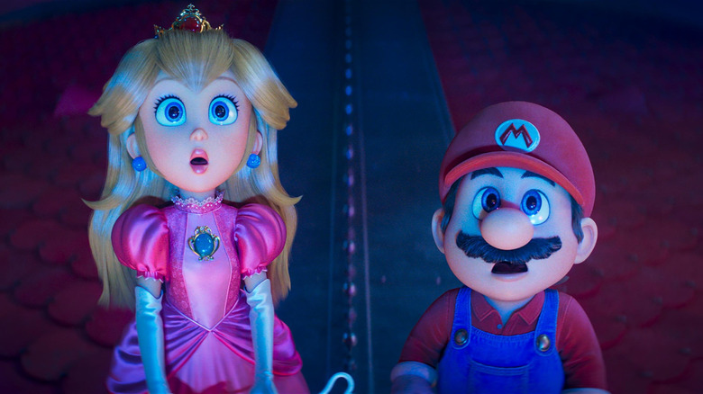 Anya Taylor-Joy as the voice of Princess Peach and Chris Pratt as the voice of Mario staring up in shock at something off-screen in The Super Mario Galaxy Movie