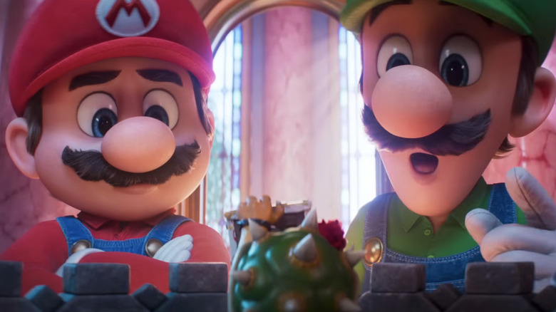 Mario and Luigi talk with Tiny Bowser in The Super Mario Galaxy Movie