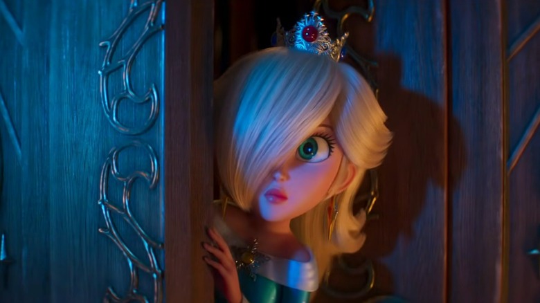 Brie Larson as Rosalina cautiously opening a door in The Super Mario Galaxy Movie