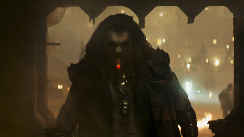Jason Momoa as Lobo smoking a cigar in Supergirl (2026)