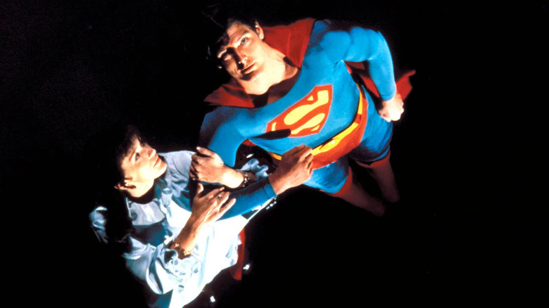 Lois Lane and Superman fly through the night sky in the 1978 film Superman