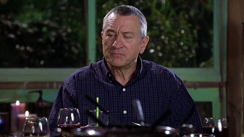 Robert De Niro drinks soda in Meet the Fockers