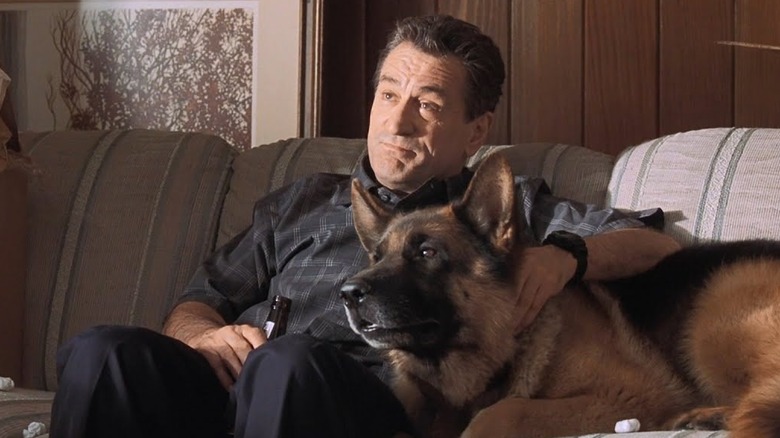 Robert De Niro pets dog and drinks beer in Showtime