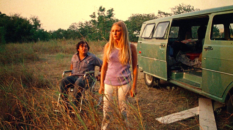 Paul A. Partain and Marilyn Burns rest outside the van in The Texas Chain Saw Massacre