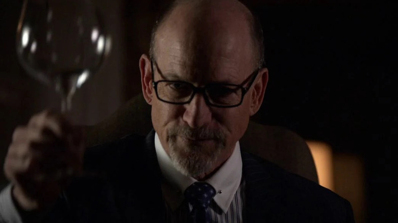 Joel Polis as the Banker holding a wine glass on Agents of Shield