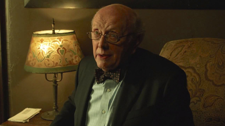 Peter Maloney as Isaac Steiner wearing a bow tie on Gotham