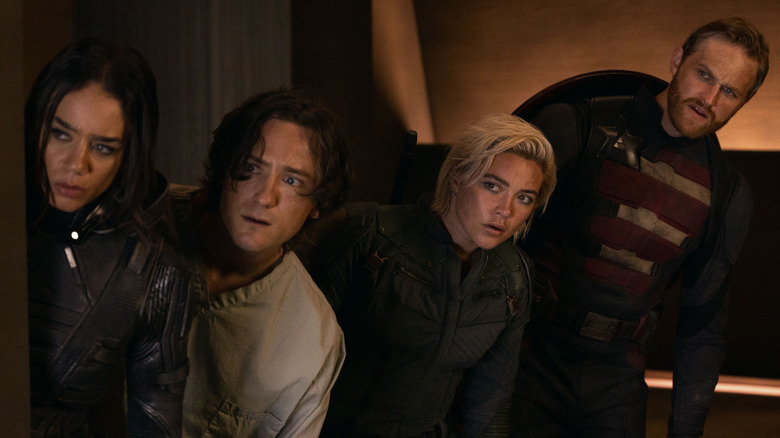 The Thunderbolts looking around a corner in Thunderbolts