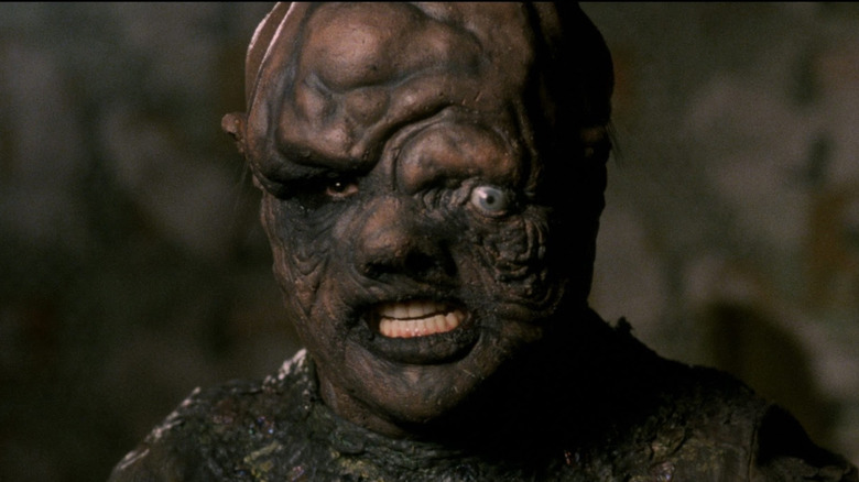 The Toxic Avenger (Mitch Cohen) stands outside in The Toxic Avenger (1984)