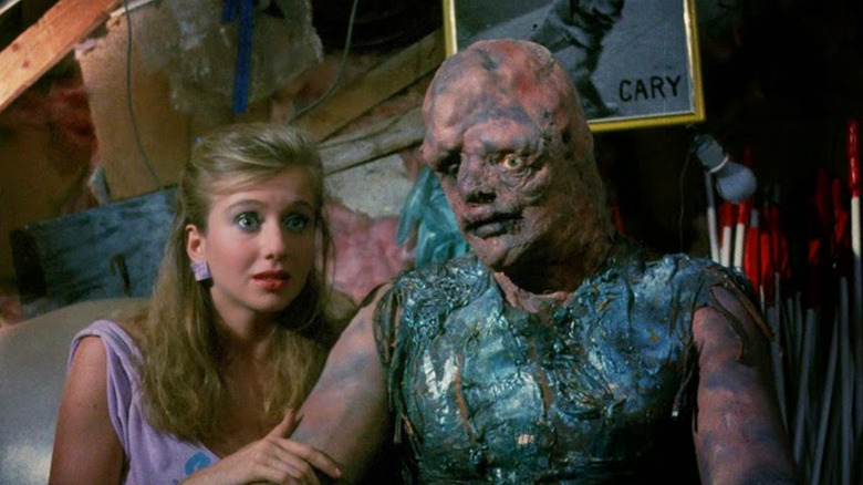 The Toxic Avenger (Mitch Cohen) next to Sara (Andree Maranda) in The Toxic Avenger (1984)