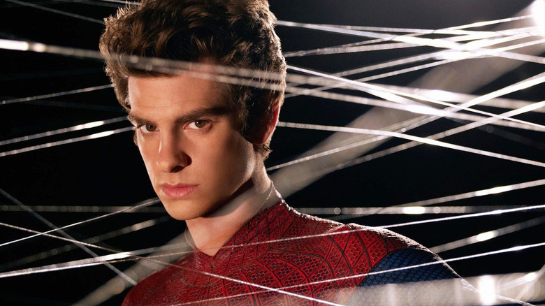 Andrew Garfield covered in spider-webbing