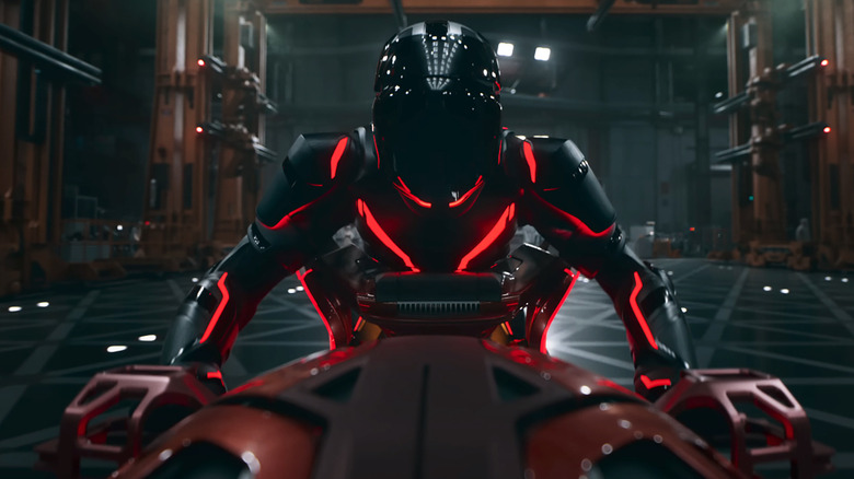 A character riding a lightcycle in Tron: Ares