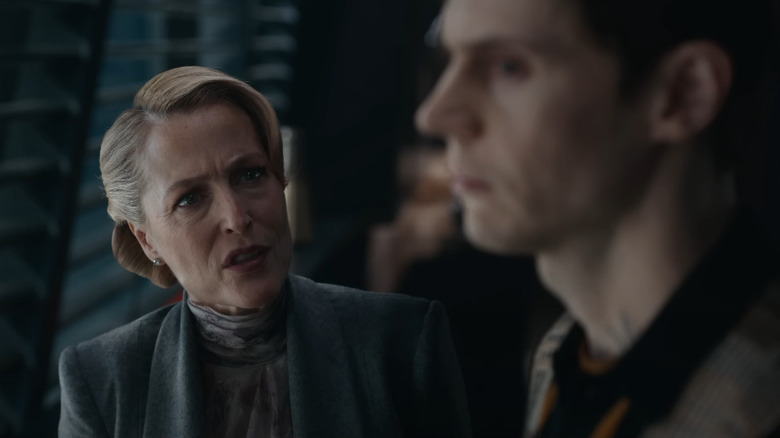 Gillian Anderson as Elisabeth Dillinger and Evan Peters as Julian Dillinger in Tron: Ares