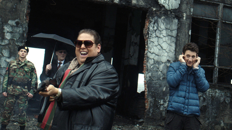 Efraim and David shooting guns in War Dogs