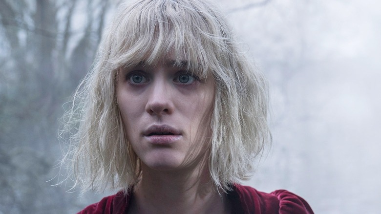 Mackenzie Davis looking scared in The Turning