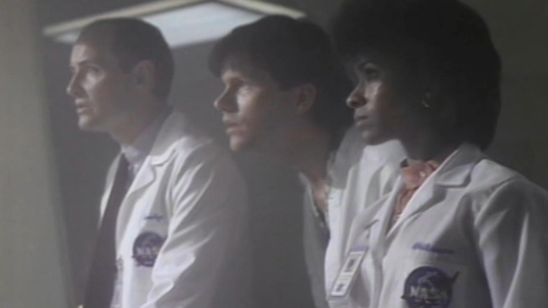 A group of NASA technicians looking amazed on The Twilight Zone