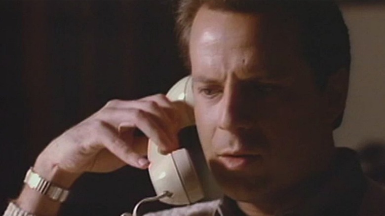 Bruce Willis as Peter Jay Novins talking on the telephone on The Twilight Zone