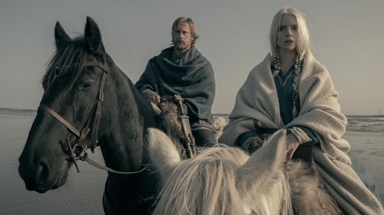Skarsgard and Taylor-Joy as Amleth and Olga on horseback in The Northman