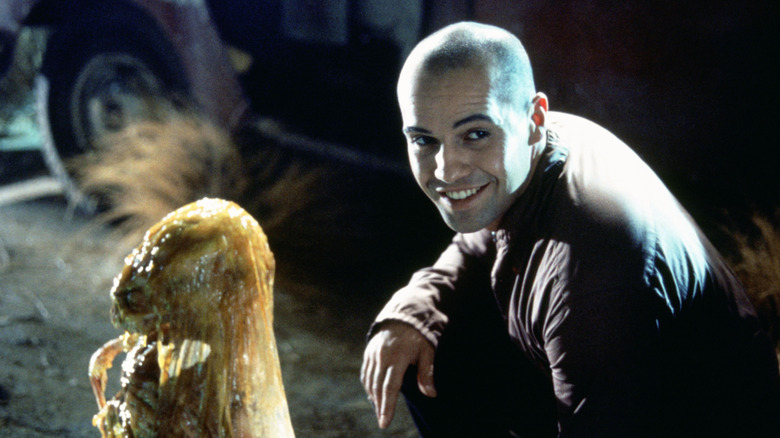 Billy Zane's Collector raising the dead outside of the hotel in Tales from the Crypt: Demon Knight