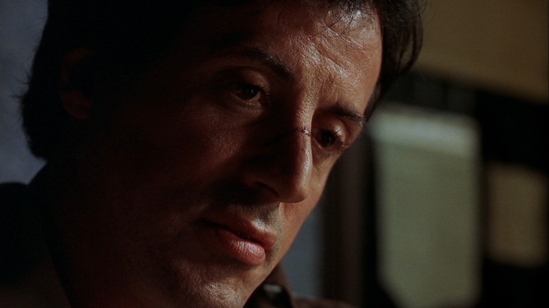 Sylvester Stallone sports a cut on his nose and a concerned look as Freddy Heflin in Cop Land