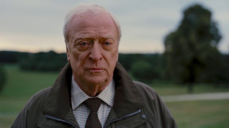 Michael Cain as Alfred Pennyworth in The Dark Knight