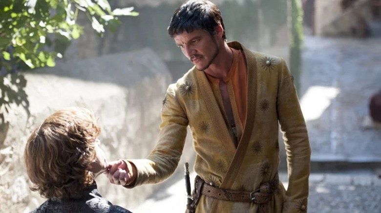 Pedro Pascal's Oberyn Martell touches the face of Peter Dinklage's Tyrion Lannister in Game of Thrones