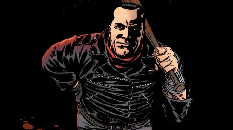 Negan with has bat Lucille on the cover of The Walking Dead #100