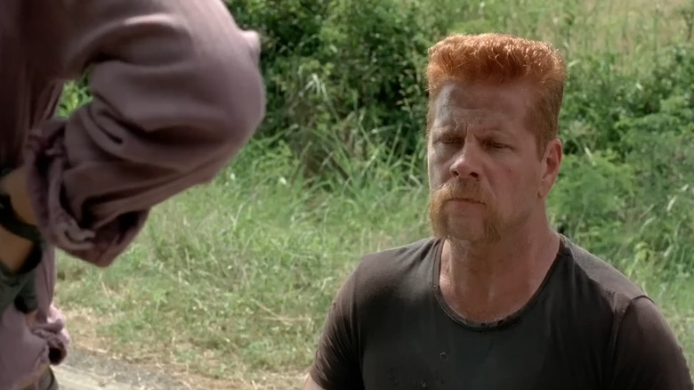 Abraham looking depressed after finding out Eugene lied to him in The Walking Dead