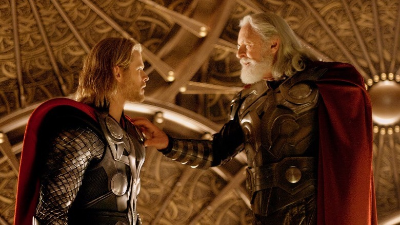 Odin hand on Thor's shoulder