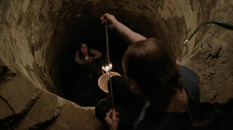 Buffalo Bill lowering the infamous lotion to Smith's character