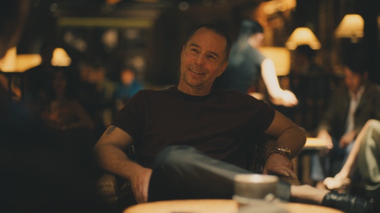 Frank sitting at a restaurant on The White Lotus