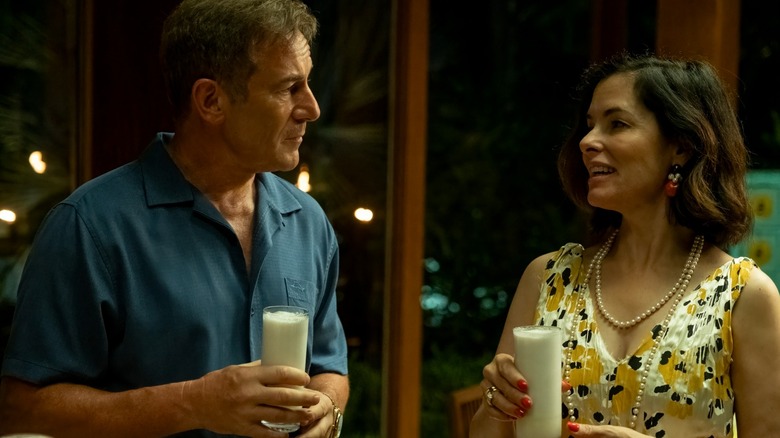 Timothy and Victoria on the verge of drinking poisoned pina coladas in The White Lotus