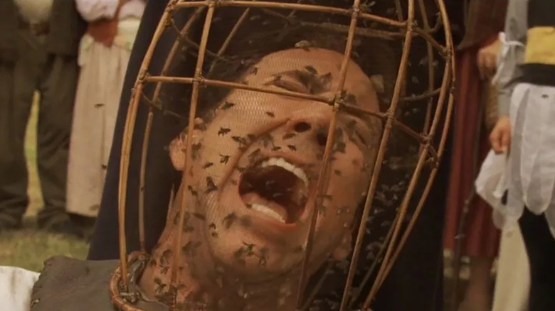 Edward screams with bees all over his face in The Wicker Man (2006)