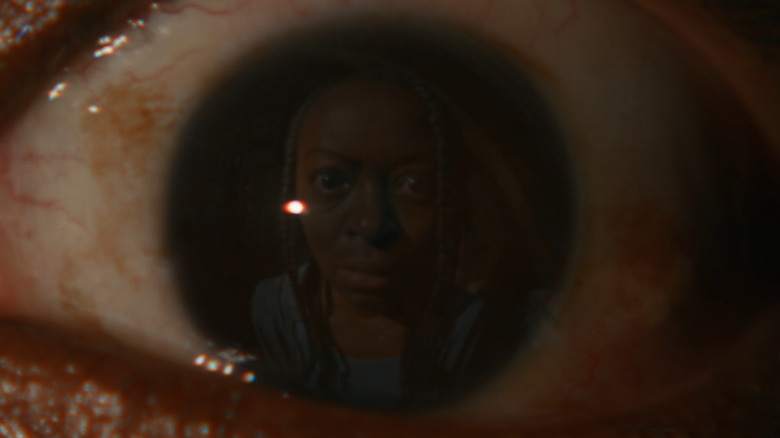 Danielle Deadwyler's Ramona being reflected in an eyeball in The Woman in the Yard