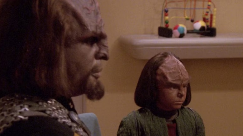 Worf (Michael Dorn) and Alexander (Brian Bonsall) are in a teacher's meeting