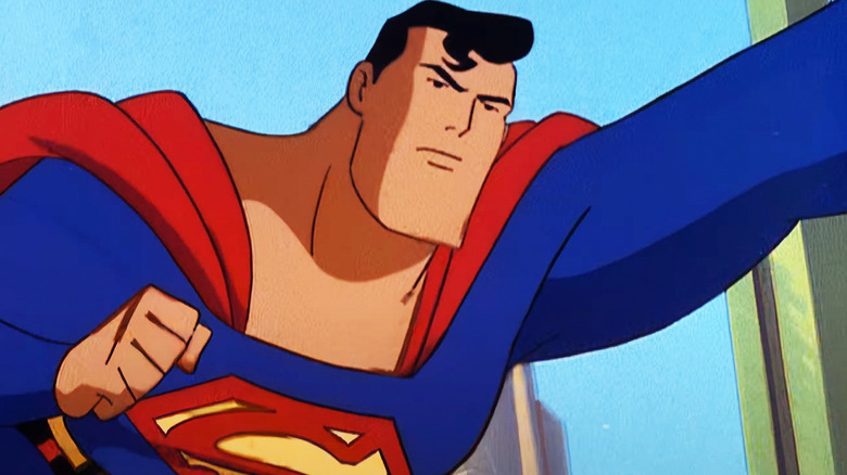 Superman is seen flying against a blue sky in Superman: The Animated Series