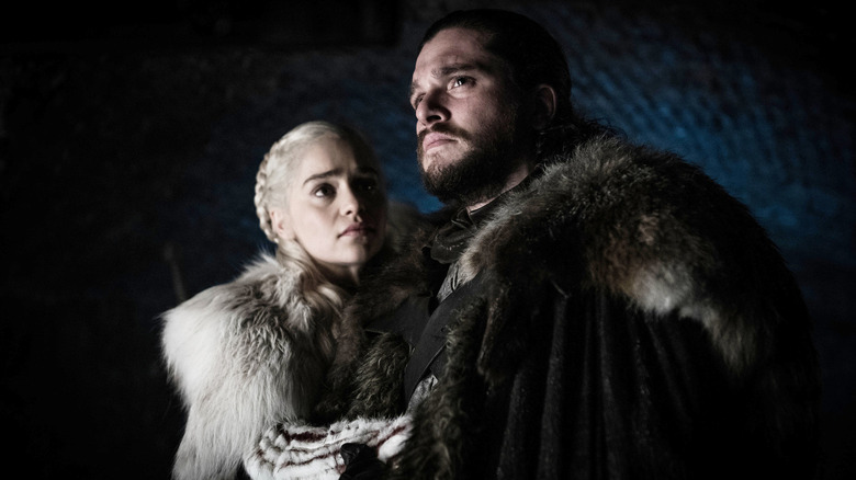 Daenerys looking at Jon and Jon looking into the distance on Game of Thrones