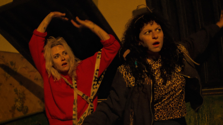 Frankie and Molly in a dumpster in The Wrong Girls