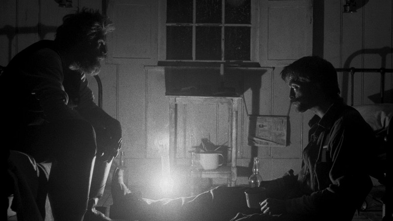 the lighthouse dafoe pattinson light lantern