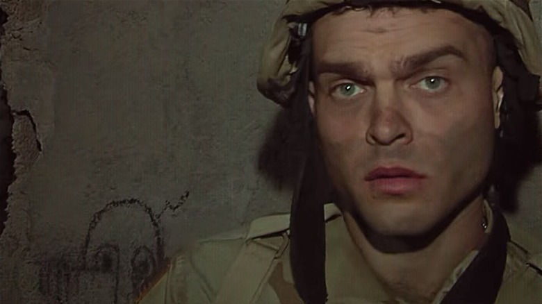 Alden Ehrenreich dirty face military uniform
