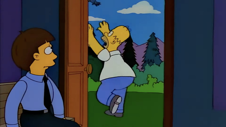 Simpsons Homer chasing after bird