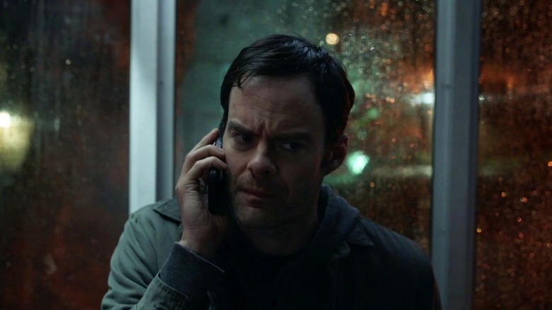 Barry on phone, rainy night