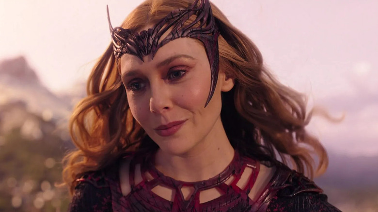 Elizabeth Olsen as the Scarlet Witch smiling in Doctor Strange in the Multiverse of Madness