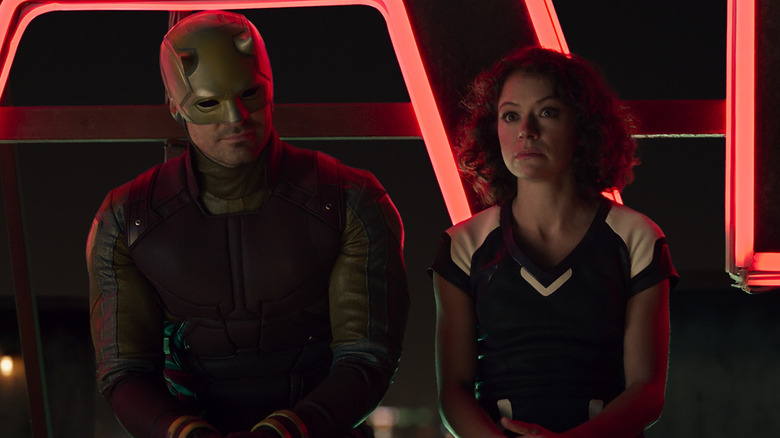 Charlie Cox as Daredevil standing next to Tatiana Maslany as Jennifer Walters on She-Hulk: Attorney at Law