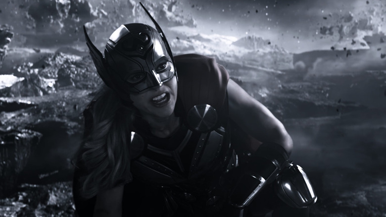 Natalie Portman as Jane Foster crouching in the Shadow Realm in Thor Love and Thunder