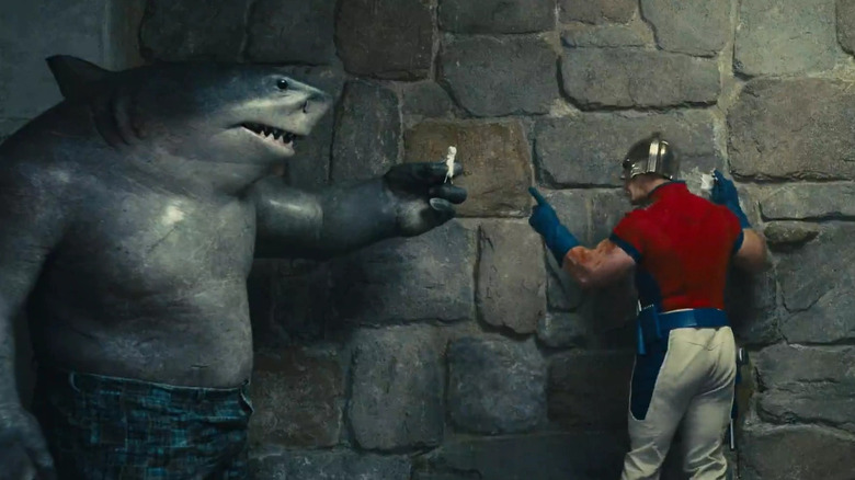 King Shark and John Cena as Peacemaker