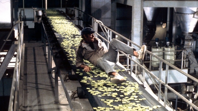 Charlton Heston on Soylent Green conveyer belt